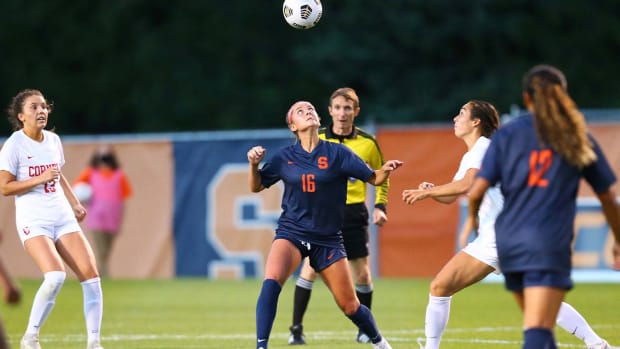 Koby Commandant heads the ball against Cornell